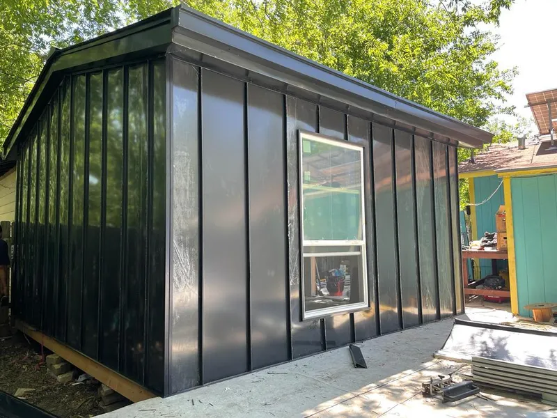 Black standing seam metal wall panels for Metal Roof Installation in LaBelle