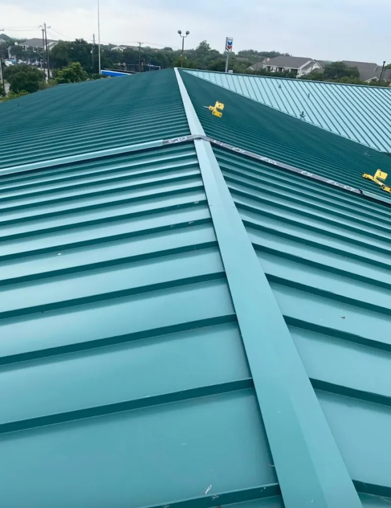 Green commercial metal roof ridge and valley for Metal Roof Repair in LaBelle