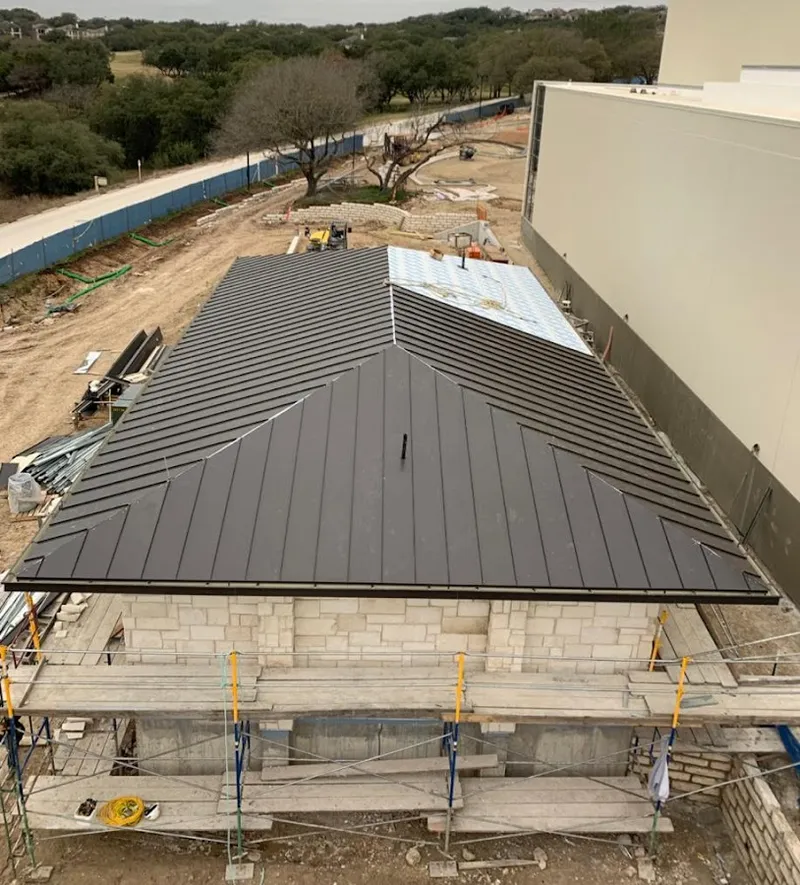 Metal roof new construction with scaffolding in LaBelle